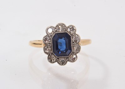 Lot 425 - Edwardian sapphire and diamond cluster ring in platinum millegrain setting on 18ct gold shank