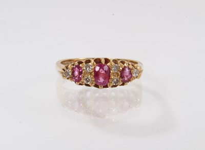 Lot 429 - Victorian style ruby and diamond ring with three oval mixed cut rubies and six diamonds in 18ct gold setting