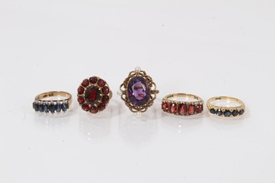 Lot 432 - Five gold and gem-set rings to include an 18ct gold sapphire five stone ring 14ct gold sapphire six stone ring and three 9ct gold gem set rings (5)