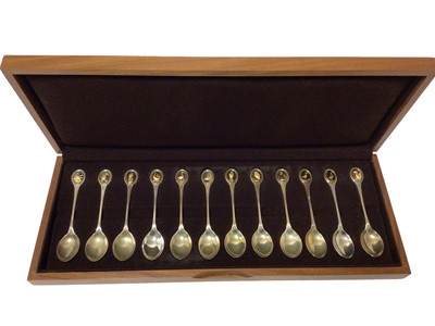 Lot 251 - Cased set of twelve RSPB silver teaspoons, with silver gilt terminals