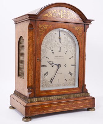 Lot 620 - Good quality late Victorian bracket clock by John Carter, London with fusee movement striking on gong, silvered arched dial with floral scrollwork and strike / silent to arch in brass inlaid oak do...