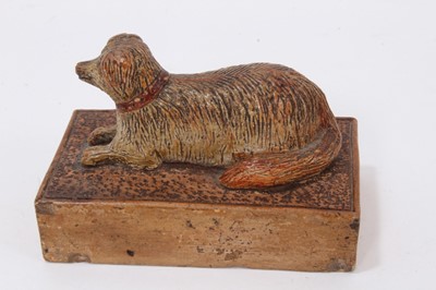 Lot 16 - A Victorian salt-glazed stoneware paperweight, surmounted by a dog, incised mark to base 'E. Le Levacher (?) 1881', 8.5cm across