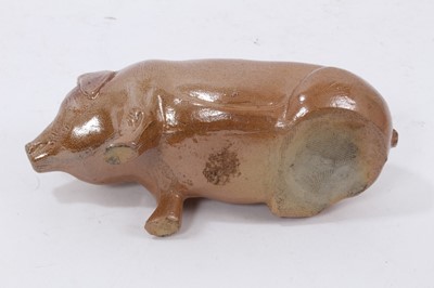 Lot 17 - A Victorian salt-glazed stoneware money box in the form of a pig, 16cm long
