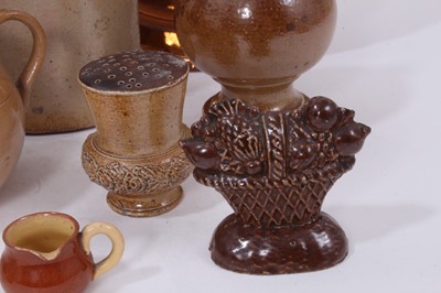 Lot 19 - A group of 19th century salt-glazed stoneware, including teapot, flask, finial, etc