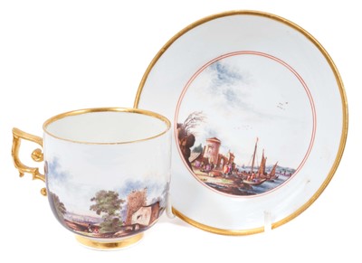 Lot 27 - Very early Meissen cup and saucer, circa 1735, decorated in the manner of Hauer