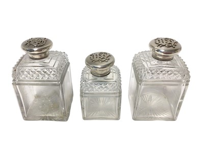 Lot 264 - Set of three Victorian silver mounted cut glass scent bottles (London 1874), maker J B (3)