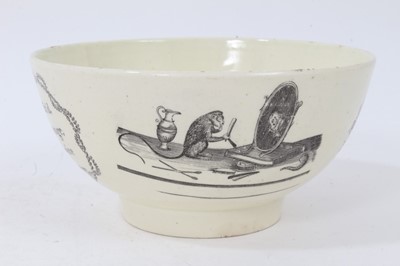 Lot 32 - 18th century cream ware bowl decorated with panels of verse and various scenes including a monkey shaving.