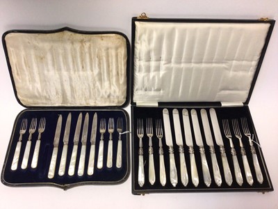 Lot 257 - 1920s set of six pairs dessert knives and forks, with silver blades and mother of pearl handles