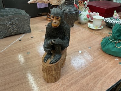 Lot 566 - 19th century Black Forest carved wood sculpture in the form of a chimp, incised mark