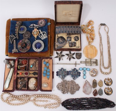 Lot 492 - Group of antique and later jewellery to include a Georgian seed pearl mourning brooch, various other brooches, earrings, Siam silver neillo jewellery, bead necklaces and an enamelled open work buck...