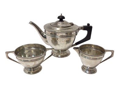 Lot 268 - 1920s silver three piece teaset