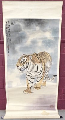 Lot 649 - Chinese scroll painting, depicting a prowling tiger, image 173 x 92cm