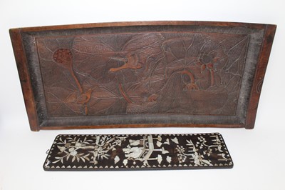 Lot 647 - Relief carved wooden Japanese tray, 91cm wide, together with a mother of pearl inlaid Chinese panel (2)