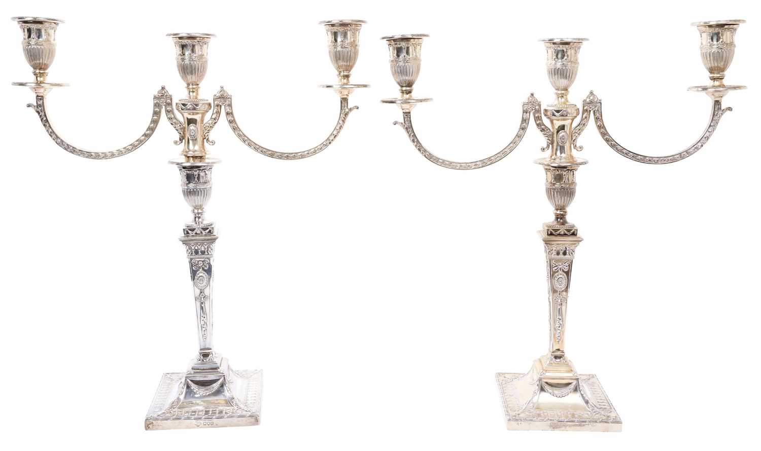 Lot 300 - Pair Impressive Victorian silver Adam-style candelabra with detachable triple branches, classical swag, ribbon and patr decoration on square bases, (London 1899) Goldsmiths & Silversmiths Co. 45cm...