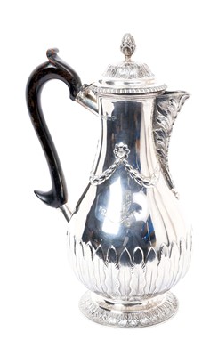 Lot 301 - Victorian silver Adam-style coffee pot with swag and leaf decoration, engraved crest on circular foot with ebonised handle ( London 1887) John Aldwinckle and Thomas Slater, 28.5cm high, 22ozs all a...