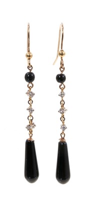 Lot 514 - Pair of diamond and black onyx pendant earrings