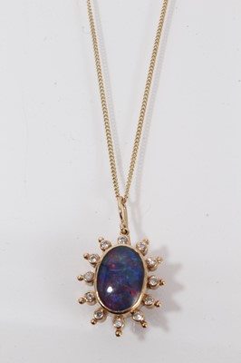 Lot 512 - Opal and diamond pendant on chain