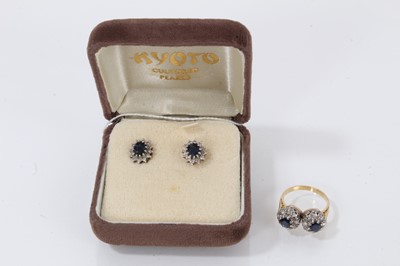 Lot 518 - Sapphire and diamond double cluster ring in 18ct gold setting and a pair of sapphire and diamond cluster earrings in 9ct earrings