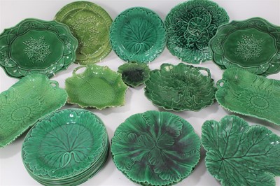 Lot 136 - Collection of 19th century green glazed majolica dishes, mostly leaf-shaped