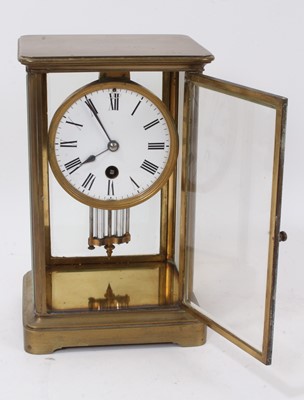 Lot 79 - Late 19th century brass four glass mantel clock with mercury pendulum.
