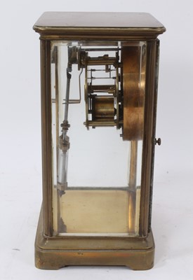 Lot 79 - Late 19th century brass four glass mantel clock with mercury pendulum.