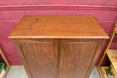 Lot 1604 - 19th century mahogany floor standing collector’s cabinet, with an arrangement of forty drawers in two banks, enclosed by pair of arched panel doors, on plinth base