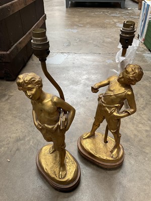 Lot 176 - Pair of French gilded lamps, signed