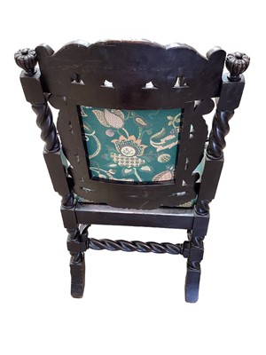 Lot 1230 - Late Victorian carved oak baronial chair