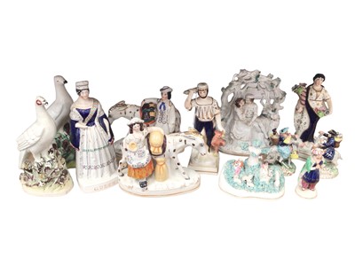 Lot 142 - Collection of Staffordshire pottery groups and figures, including the Welsh tailor and his wife, an Ottoman figure, etc