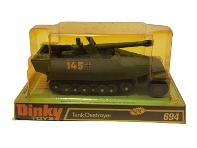 Lot 17 - Dinky Bren Gun Carrier with Anti-Tank Gun No.619, 88mm Gun No.656, Tank Destroyer No.694, all in bubblepack & base (3)