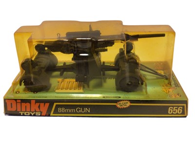 Lot 17 - Dinky Bren Gun Carrier with Anti-Tank Gun No.619, 88mm Gun No.656, Tank Destroyer No.694, all in bubblepack & base (3)