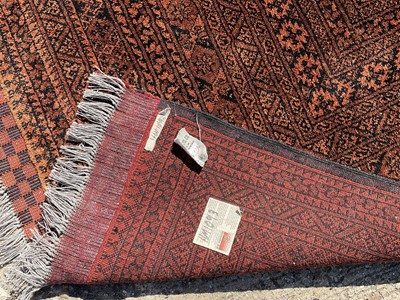 Lot 1262 - Large gold Afghan carpet