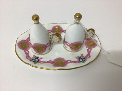 Lot 34 - Minton porcelain double candle snuffers on stand