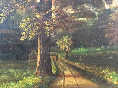 Lot 57 - Belgian School, oil on panel, an extensive wooded landscape with a figure on a path