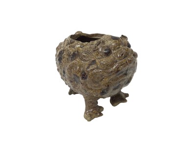Lot 29 - A grotesque three-legged pottery toad