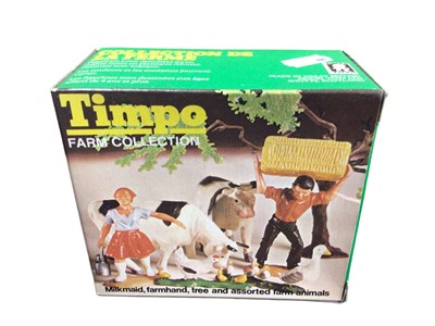 Lot 132 - Timpo Collection 5 Prehistoric Animals & Farm Collection Milkmaid, Farmhand, Tree and assorted Farm Animals, boxed (2)