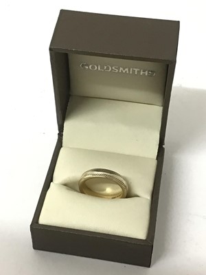 Lot 31 - 9ct white and yellow gold wedding ring