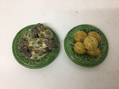 Lot 14 - Pair of Portuguese 'Caldas' small majolica dishes, one with walnuts and the other with sardines, 11.5cm diameter