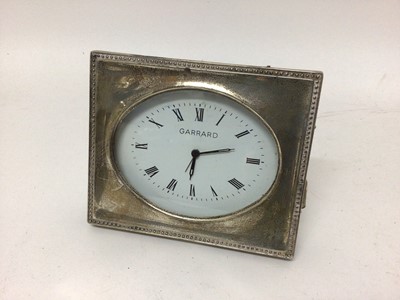 Lot 1000 - A silver-cased Garrard alarm clock, 11.5cm x 9.5cm