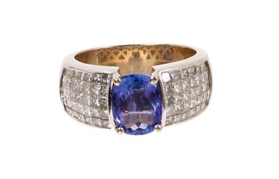 Lot 750 - Tanzanite and diamond ring