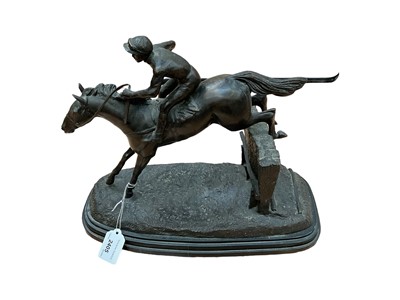 Lot 2405 - French bronze sculpture of a jockey and horse leaping a fence, on a marble base