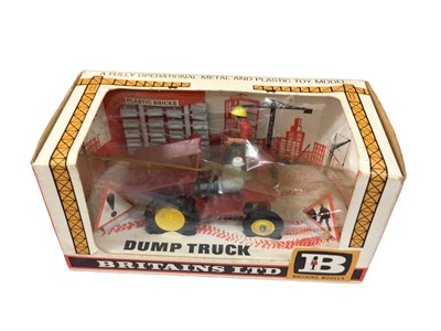 Lot 215 - Britains Autoway No. 9832 post hole digger, No. 9830 mini trailer, No. 9536 rear mountain digger (x2) plus 9670 dump truck, all boxed (5)