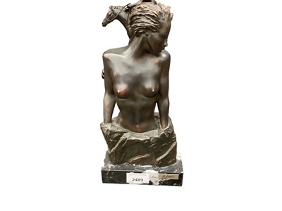 Lot 2489 - Erotic bronzed sculpture of a woman on a marble base