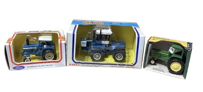 Lot 225 - ERTL 1:32 scale die cast farm machinery including Farm Set No.5066, Ford 4 wheel-drive Tractor No.1926, Case 4890 4 wheel-drive Tractor No.1637, Ford TW20 Tractor No.1643, International Round Baler...