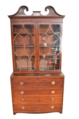 Lot 1588 - George III mahogany two height secretaire bookcase