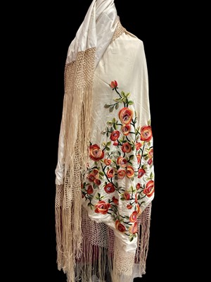 Lot 2090 - 1930's fringed silk shawl hand-embroidered floral design in satin stitch.  Plus a linen tablecloth, hand-embroidered