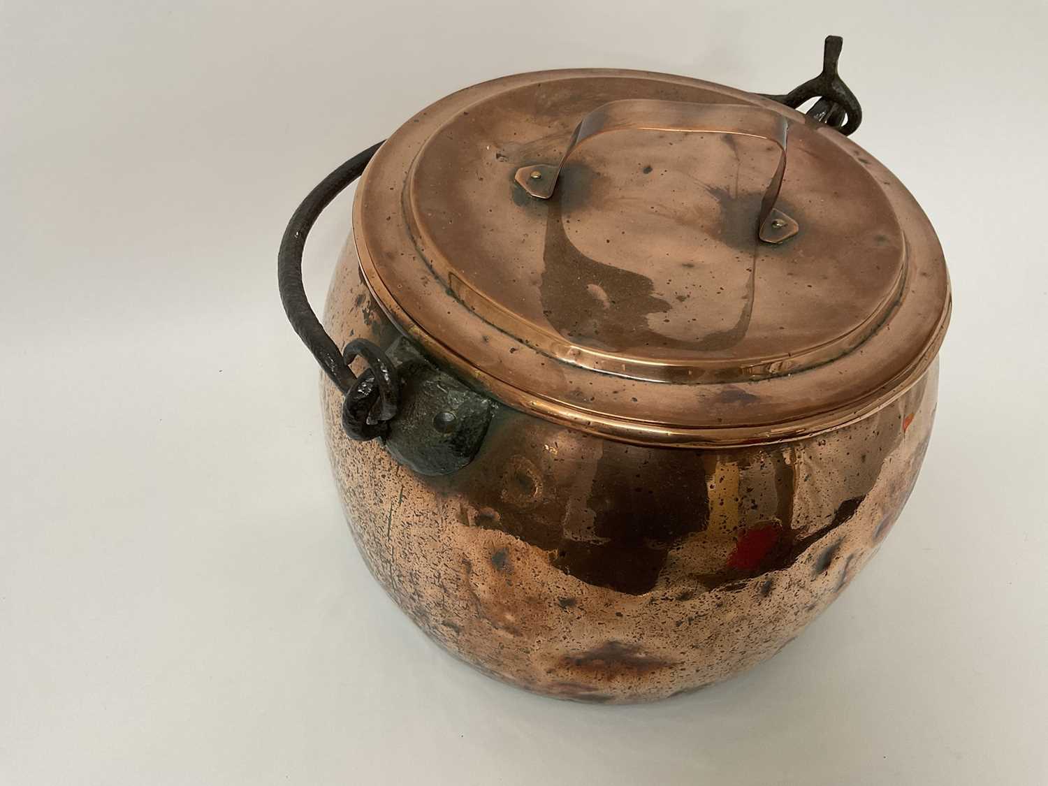 Lot 78 - Large Victorian copper cauldron with forged iron handle