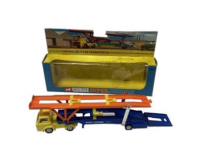 Lot 289 - Corgi Juniors police station set No. 3052 transporter No. 3105, James Bond Spy Who Loved Me gift set No. 3030, E2007 low loader and shovel, No. 2002 Haynor Mk11 car transporter, all boxed (5)