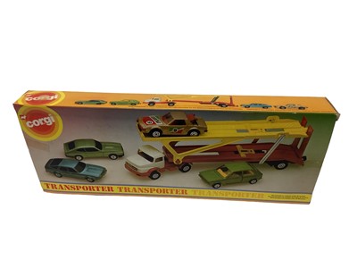 Lot 289 - Corgi Juniors police station set No. 3052 transporter No. 3105, James Bond Spy Who Loved Me gift set No. 3030, E2007 low loader and shovel, No. 2002 Haynor Mk11 car transporter, all boxed (5)