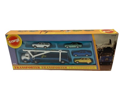 Lot 289 - Corgi Juniors police station set No. 3052 transporter No. 3105, James Bond Spy Who Loved Me gift set No. 3030, E2007 low loader and shovel, No. 2002 Haynor Mk11 car transporter, all boxed (5)